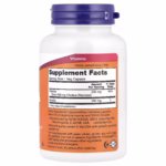White vitamin bottle with a purple cap; label shows 'Supplement Facts' and serving size '1 Veg Capsule' on an orange panel